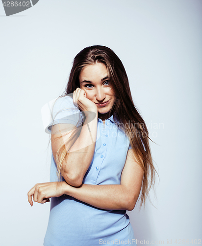 Image of young pretty teenage hipster girl posing emotional happy smiling on white background, lifestyle people concept