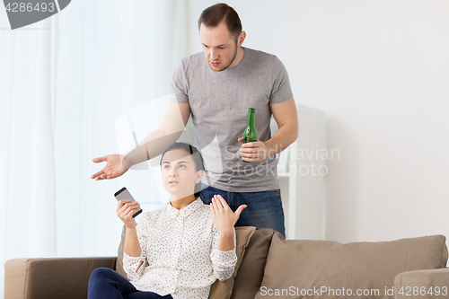 Image of couple having argument at home