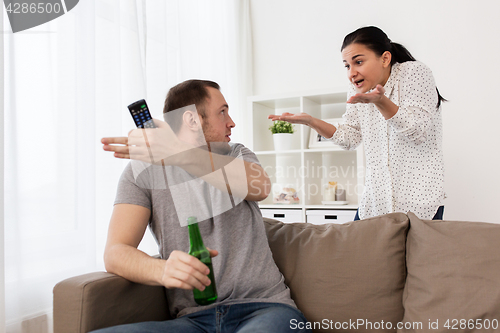 Image of couple having argument at home