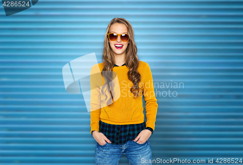 Image of happy young woman or teen girl in casual clothes