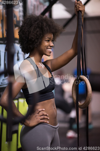 Image of portrait of black women after workout dipping exercise