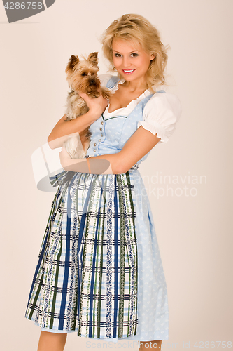 Image of Bavarian girl with dog