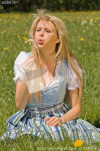 Image of Bavarian girl in the meadow