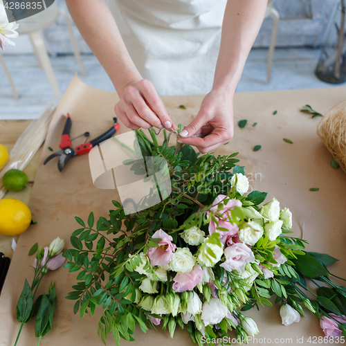 Image of Woman florist in flower shop