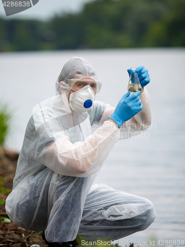 Image of Laboratory assistant with test tube