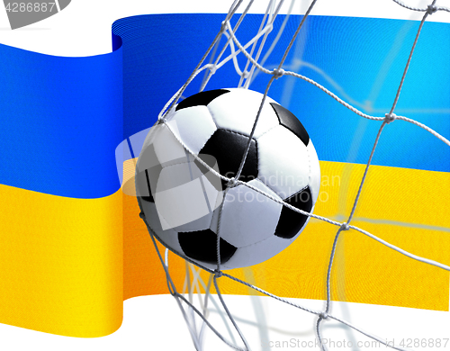 Image of soccer ball on Ukrainian flag