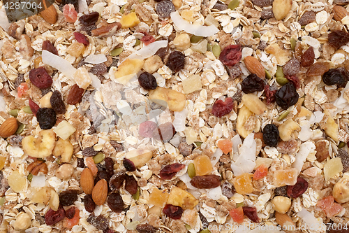 Image of Muesli background - mixed fruit and nuts with cereal flakes