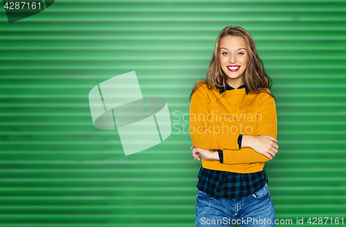 Image of happy young woman or teen girl in casual clothes