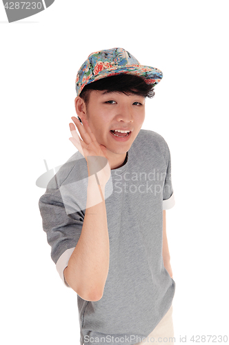Image of Happy Asian man with cap.