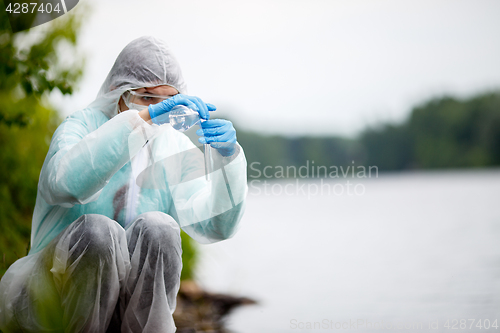 Image of Laboratory assistant with test tube