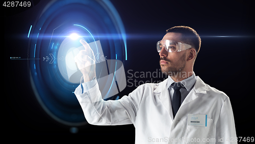 Image of scientist in goggles with virtual projection