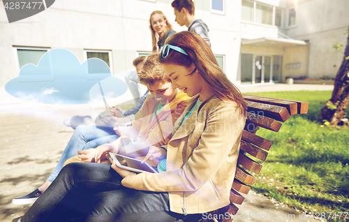 Image of group of students with tablet pc at school yard