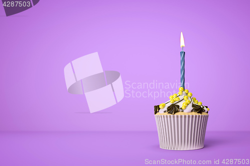 Image of purple cupcake with a candle