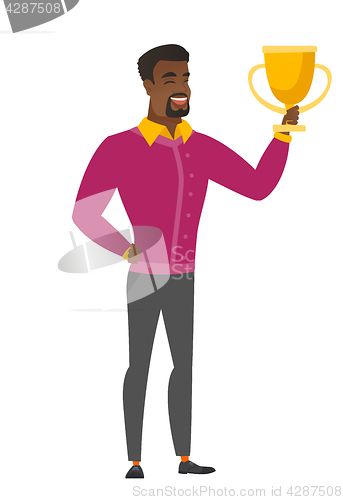 Image of African-american business man holding a trophy.