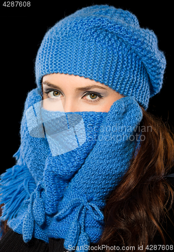 Image of Young happy woman wearing winter cloth