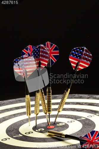 Image of Darts On A Black