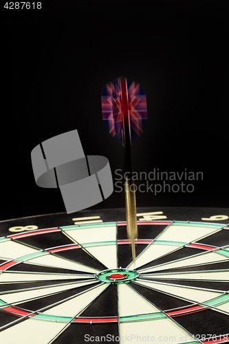 Image of Darts On A Black
