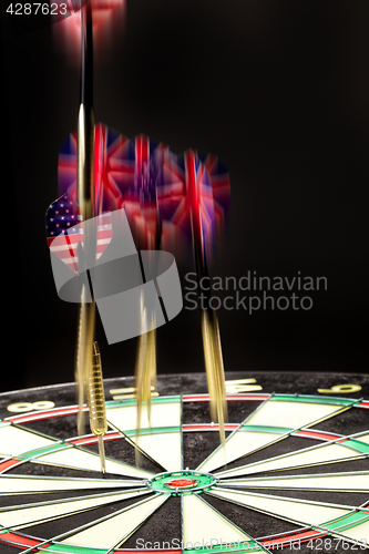 Image of Darts On A Black