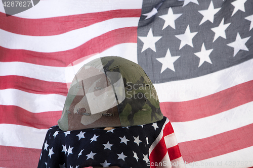 Image of Old Army Helmet And Flag