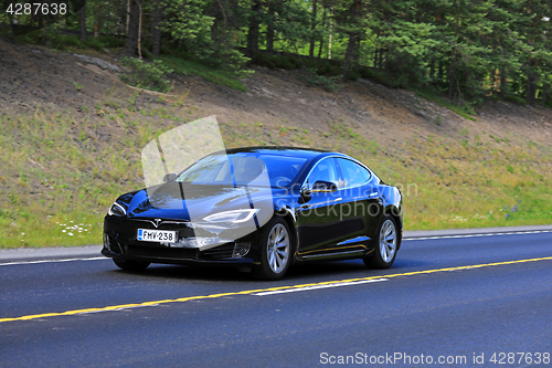Image of New Black Tesla Model S on the Road