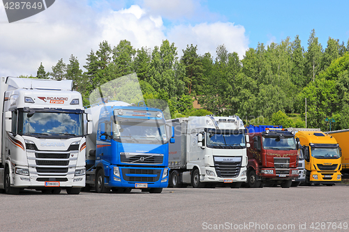 Image of Commercial Heavy Trucks Parked on a Truck Stop 