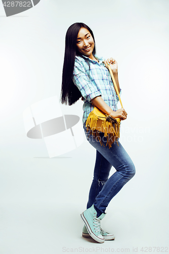 Image of young pretty asian woman posing cheerful emotional isolated on white background, lifestyle people concept