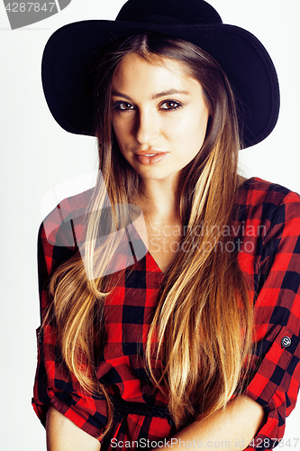Image of young pretty brunette girl hipster in hat on white background casual close up dreaming smiling. real american modern woman, lifestyle real people concept