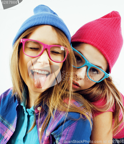 Image of best friends teenage girls together having fun, posing emotional on white background, besties happy smiling, lifestyle people concept close up. making selfie