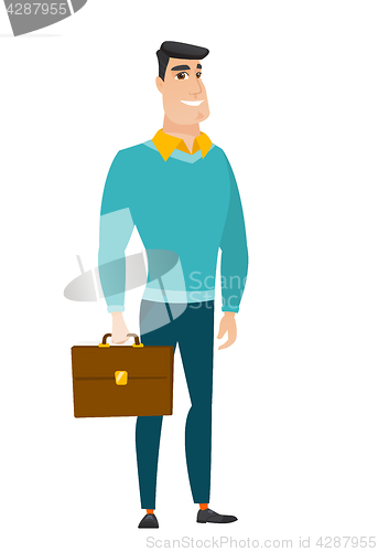 Image of Caucasian business man holding briefcase.