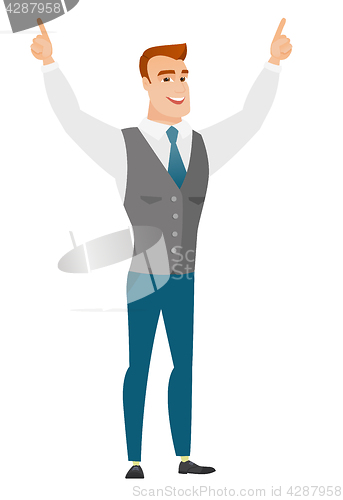 Image of Businessman standing with raised arms up.