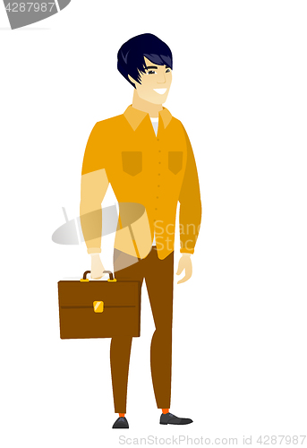 Image of Asian business man holding briefcase.