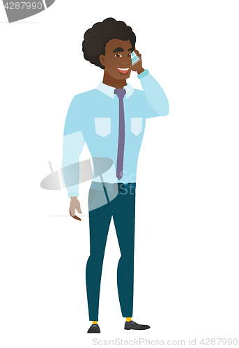 Image of Businessman talking on a mobile phone.