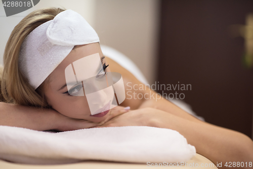 Image of woman laying on massage table