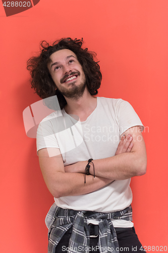 Image of young man with funny hair over color background