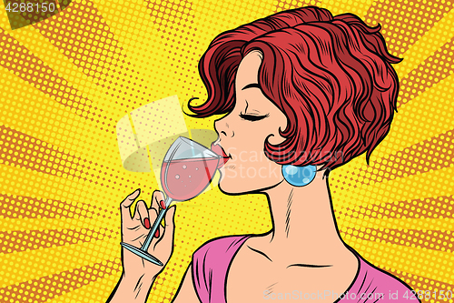 Image of Woman drinking red wine