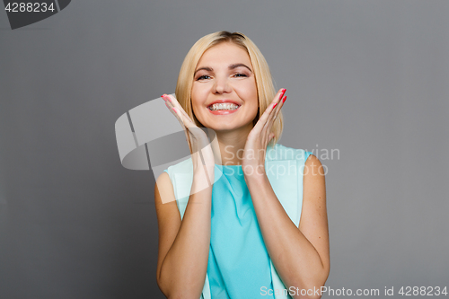 Image of Beautiful woman,, hands at face