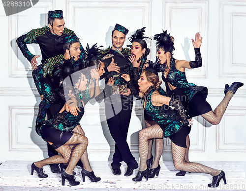 Image of The studio shot of group of retro dancers