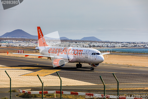 Image of ARECIFE, SPAIN - APRIL, 15 2017: AirBus A320 of easyjet.com read