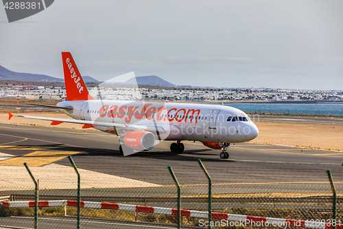 Image of ARECIFE, SPAIN - APRIL, 15 2017: AirBus A320 of easyjet.com read