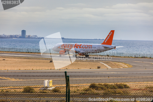 Image of ARECIFE, SPAIN - APRIL, 15 2017: AirBus A320 of easyjet.com read