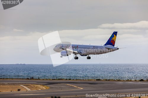 Image of ARECIFE, SPAIN - APRIL, 15 2017: AirBus A320 of small planet wit