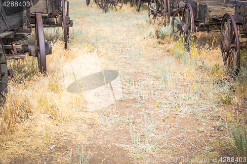 Image of Abstract of Vintage Antique Wood Wagons and Wheels.