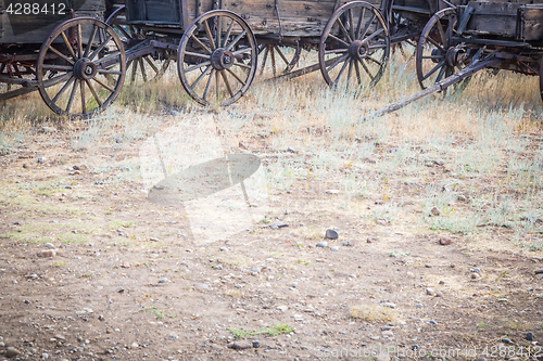 Image of Abstract of Vintage Antique Wood Wagons and Wheels.