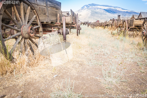 Image of Abstract of Vintage Antique Wood Wagons and Wheels.