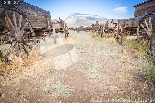 Image of Abstract of Vintage Antique Wood Wagons and Wheels.