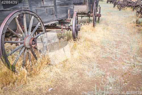 Image of Abstract of Vintage Antique Wood Wagons and Wheels.