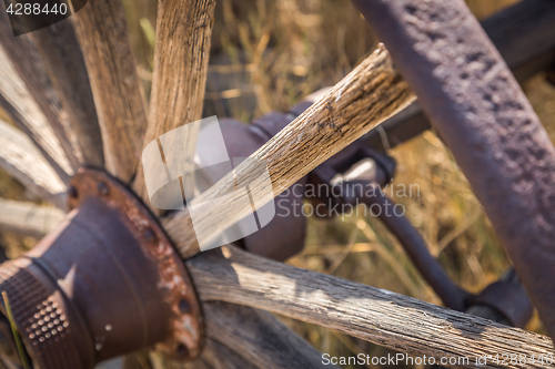 Image of Abstract of Vintage Antique Wood Wagon Wheel.