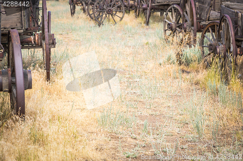 Image of Abstract of Vintage Antique Wood Wagons and Wheels.