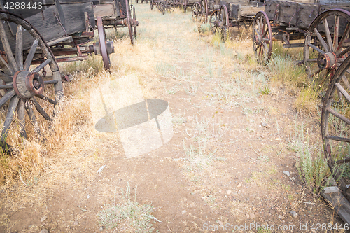 Image of Abstract of Vintage Antique Wood Wagons and Wheels.