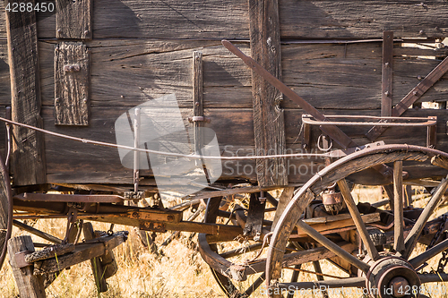 Image of Abstract of Vintage Antique Wood Wagons and Wheels.